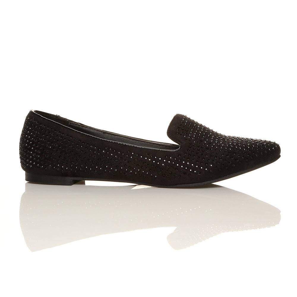 Elegant black woven loafer shoe with a low heel.